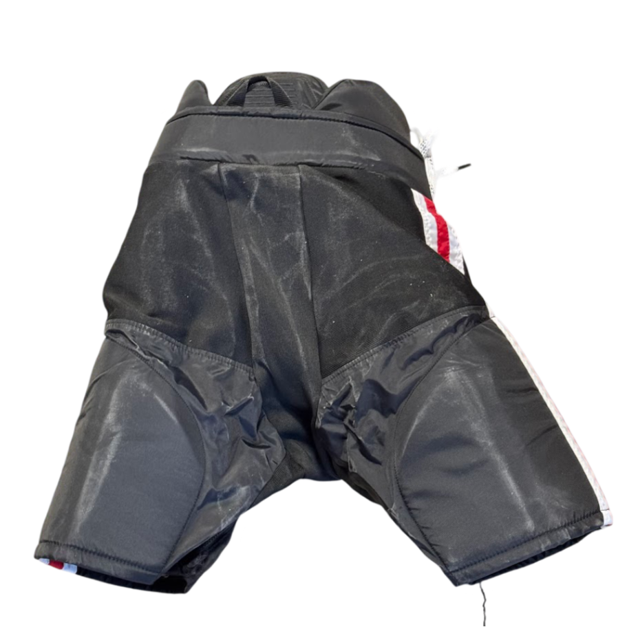 Pantalon de hockey CCM HPWM2 d'occasion pour femme – NCAA Pro Stock (noir/rouge/blanc)